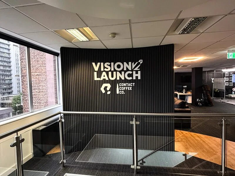 An image of the Vision Launch Contact Coffee Co. interior signage.